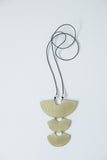 Brass Protector Necklace on display