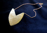 Brass Tulip Necklace on display