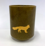 Tumbler with gold fox design.