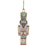 Decorative nutcracker ornament on a white background