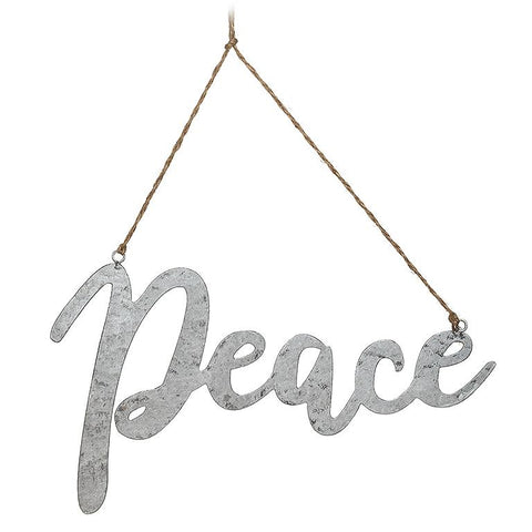 Decorative sign with 'Peace' text hanging on a white background