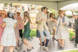 People dressed in 1920s costumes dancing