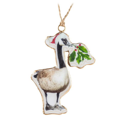 Canadian Goose Holiday Ornament shown wearing a Santa Hat and with holly in beak 