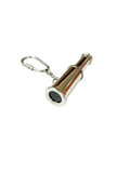 Metallic keychain with a cylindrical design on a white background