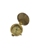 Brass compass on a white background
