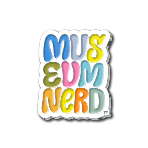 Lapel pin that says Museum Nerd 