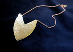 Brass Tulip Necklace on display 