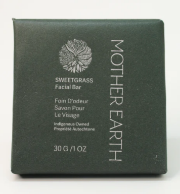 Green packaging of Mother Earth Sweetgrass Facial Bar on a white background