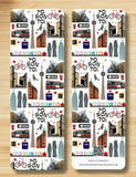 Two bookmarks with Toronto-themed designs on a wooden surface