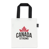 White tote bag with 'Canada Strong' text and red maple leaf on a white background