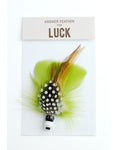 Close product shot of shamrock green answer feather for luck