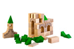 Wooden blocks with some assembled and some scattered