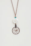 Close product shot of Mother of Pearl Shell Dream Catcher Necklace