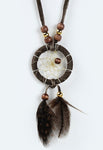 Close product shot of dream catcher necklace in dark brown