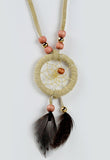 Close product shot of dream catcher necklace in tan
