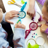 Image showing kids making dream catchers with the rainbow kit