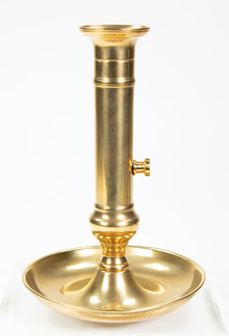 Brass candlestick with attached tray