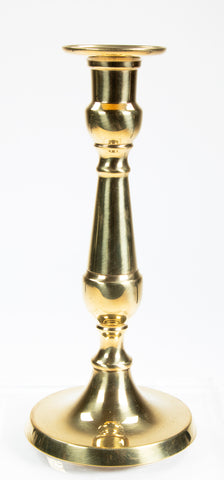 Brass candlestick with ornate, sculpted design