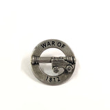 Pewter pin of Cannon in circle engraved with War of 1812