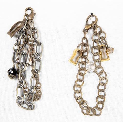 Two chain bracelets with keyhole and crystal charms