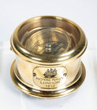 Close product shot of naval brass gimbal compass