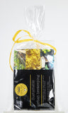 Close product shot of decorative cellophane packaging with yellow ribbon 