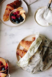 Beeswax Wraps covering a plate of croissants