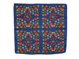 Blue background with strawberries, white flowers and green leaves.