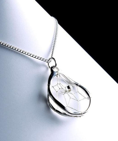 Close product shot of sterling silver teardrop dream catcher pendant