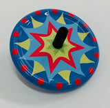 Tin spinning top with starburst design