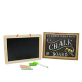 Close product shot of chalkboard with chalk and eraser.
