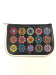 Black coin purse with embroidered flowers.