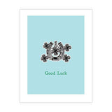 Eco-friendly greeting card with horse shoe and clover illustration and the words "Good Luck"