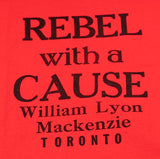 Close up of text "Rebel with a Cause William Lyon Mackenzie Toronto" printed in black on a red t-shirt