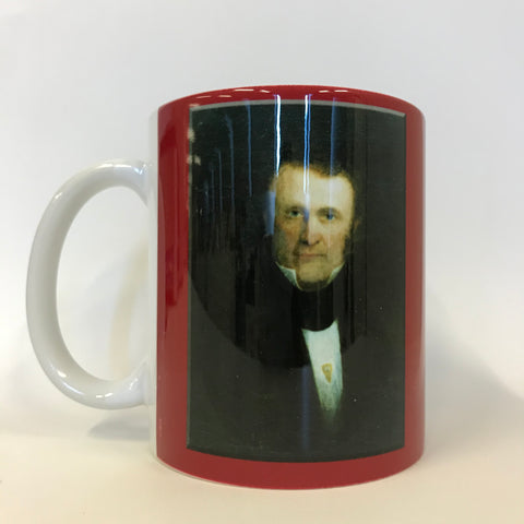  A portrait of William Lyon Mackenzie on red mug with white handle