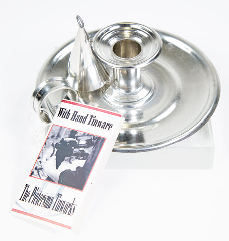 Image of dover candle holder with maker's tag and snuffer shown