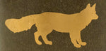 Close up of gold fox design.