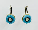 Vintage button hanging earrings with blue and white flower design