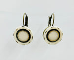 Vintage button hanging earrings with white, black and gold circle design