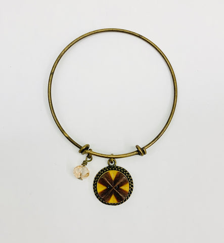 Vintage button bangle bracelet with brown cross