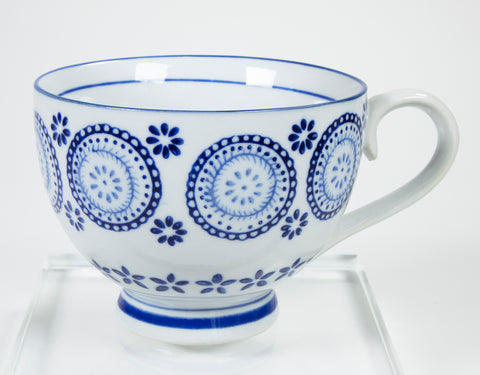 Teacup with floral design in blue