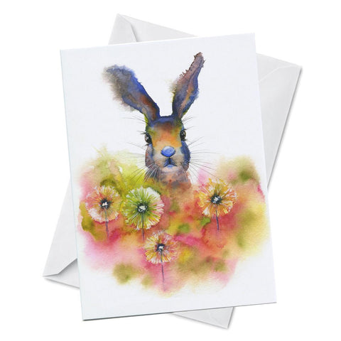 Greeting card with watercolour artwork of a rabbit in a field of dandilions