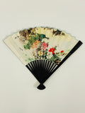 Unfolded fan shown with Peacock print