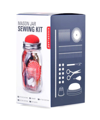 Angled view of Kikkerland mason jar sewing kit in box