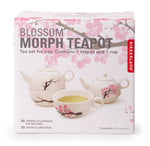 Front view of Kikkerland blossom morph teapot in box