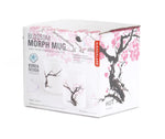 Angle view of the Kikkerland blossom morph mug in box