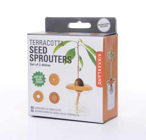 Angled view of Kikkerland terracotta seed sprouters in box