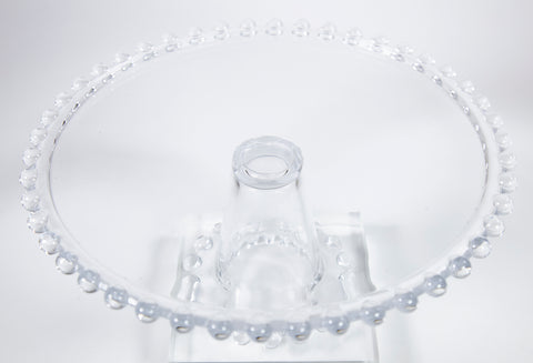 Close up of glass pedestal cake plate