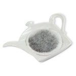 Teapot teabag holder with teabag on top