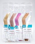 Group shot of reusable bent straws with brush in resealable packaging